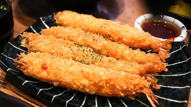 four shrimp in line